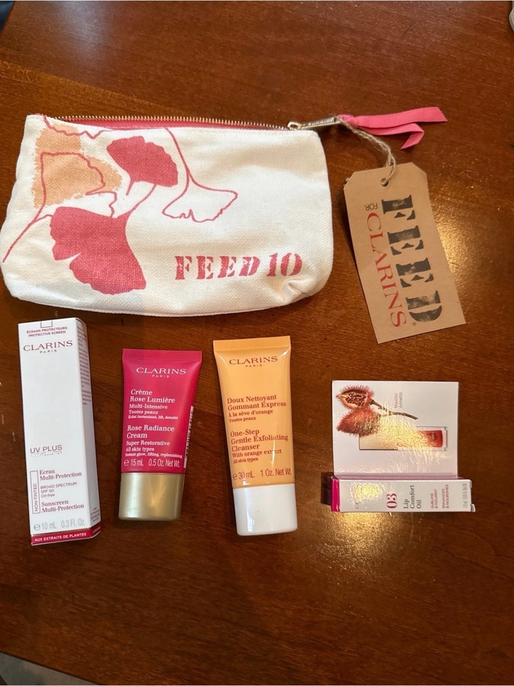 Clarins Paris skincare products with travel bag